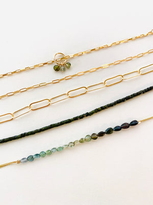 GREEN TOURMALINE AND CHAIN BRACELETS