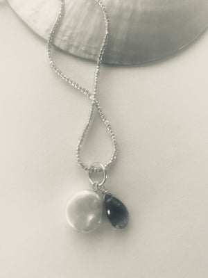 TIBETAN COIN WITH PEARL TOPAZ